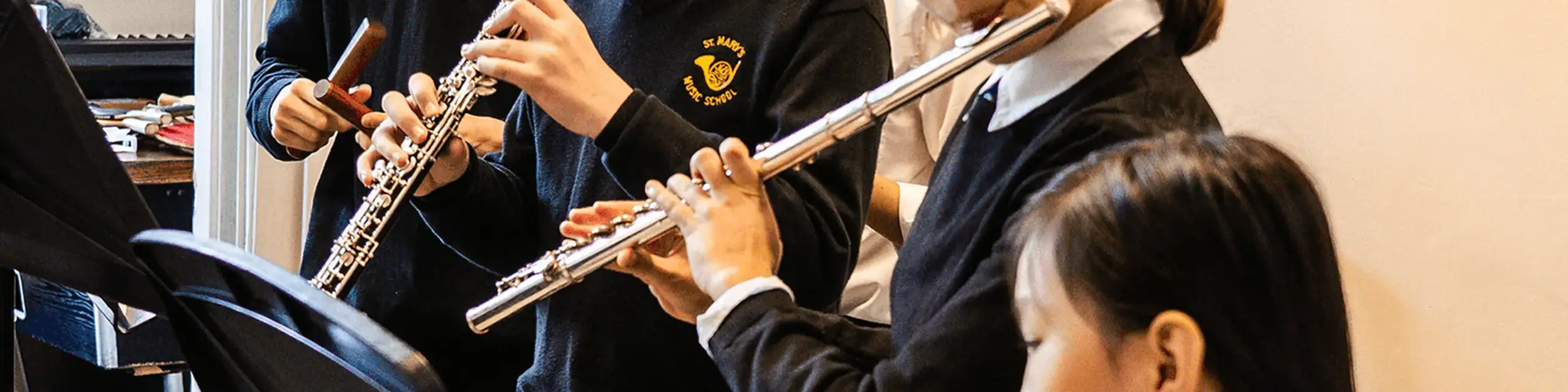 St. Mary's Music School violin pupil performing at a Christmas concert