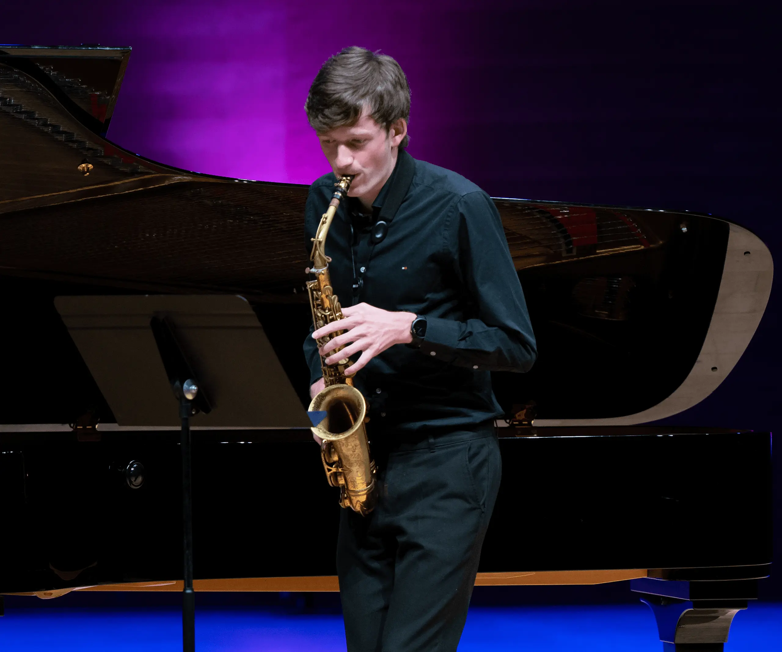 St. Mary's Music School pupil performs on a saxophone